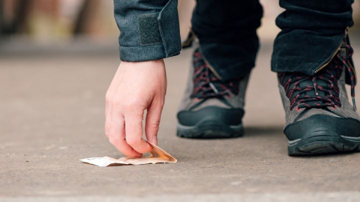 Descubre el significado de encontrar dinero en la calle